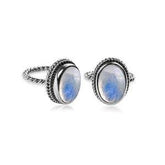 Handcrafted sterling silver Rainbow Moonstone Quartz ring with oval cabochon Quartz and rope bezel, artisan jewelry from Indonesia.